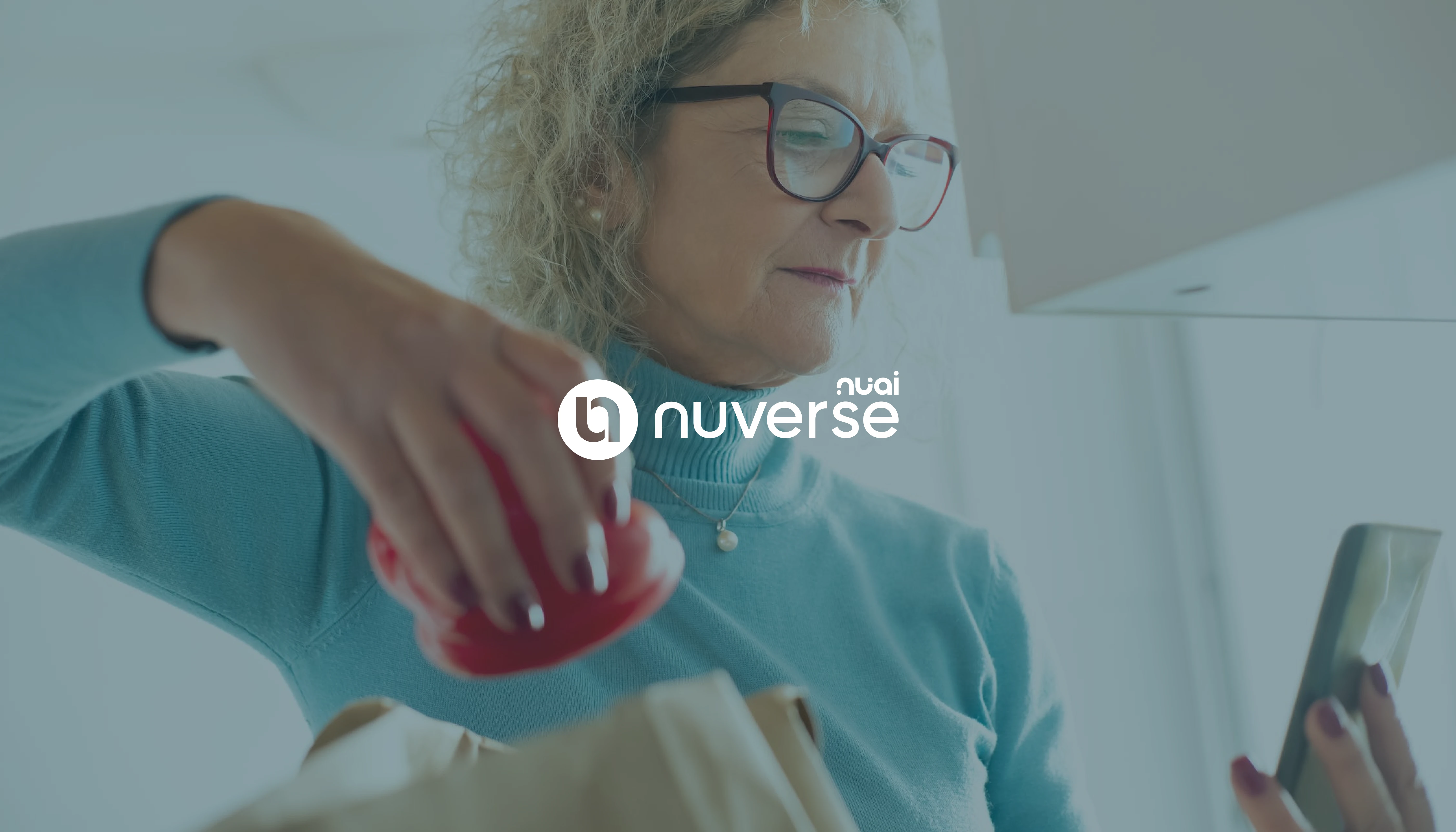 Senior woman checking the Nuverse NuAI health app on her smartphone.